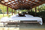 Its pavilion with a pizza oven and bar would be a nice place for a next-day brunch or cocktail hour. See that chalkboard hanging from the rafters in the back? It'd be a perfect spot for detailing your signature drinks or pizza picks. Its pavilion with a pizza oven and bar would be a nice place for a next-day brunch or cocktail hour. See that chalkboard hanging from the rafters in the back? It'd be a perfect spot for detailing your signature drinks or pizza picks.