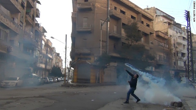 [120101113622-syria-homs-tear-gas-grenade-story-top%255B2%255D.jpg]