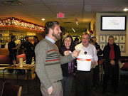 Ben announces a draw prize winner at the Victoria Labour Council holiday social