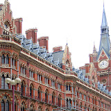 The ornate Gothic Revival facade and clock tower of Sir George Gilbert Scott's Midland Hotel