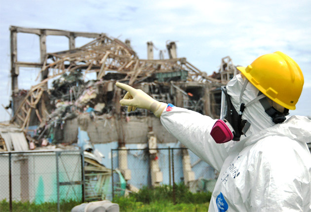 International Atomic Energy Agency fact-finding team leader Mike Weightman inspects the damage to the Fukushima Daiichi nuclear power station in May, 11 weeks into the disaster. AP