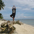 Alvin doing a yoga stance in Babu Santa Beach Resort, Talikud Island