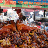 Urumqi - Marché de rue, le hacheur de volaille