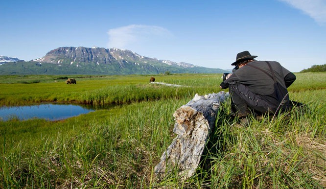 DISNEYNATURE IS WILD ABOUT “BEARS” -- Cinematographer Warwick Sloss films two brown bears as they graze in the meadows of Katmai National Park , Alaska. The stunning imagery is being captured for Disneynature’s 2014 motion picture release “Bears,” directed by Keith Scholey (“African Cats”) and Alastair Fothergill (“Earth,” “African Cats” and “Chimpanzee”).