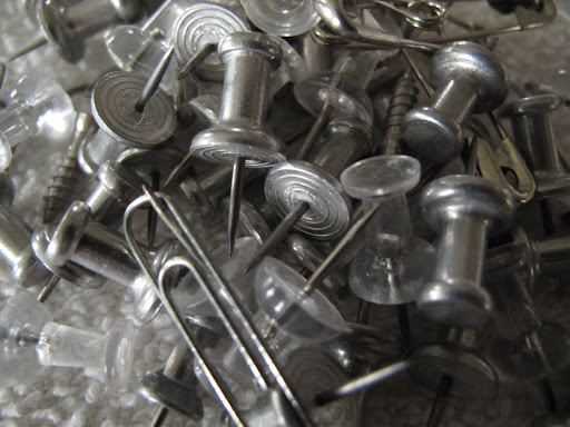 This pile looks like a mess!  Push pins, safety pins, paper clips, and screws!  It's time to organize.