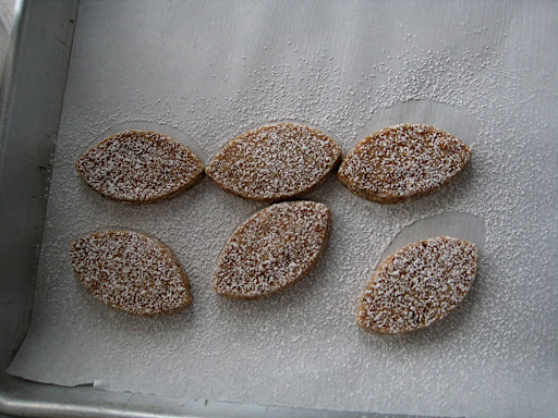 The shortbread cookies under a delicate dusting of powdered sugar.