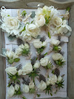 Here you can see all the boutonnieres, which were created by Heather at Gathering Events. Loved the feather accents!