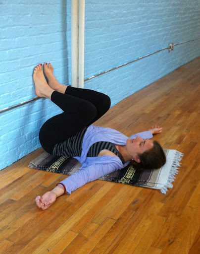 After 5 or more minutes either roll back on your side or press the feet into the wall, around knee height.