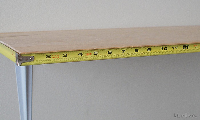 Use busted tape measures to decorate shelves - choosetothrive.blogspot.com