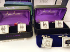 This photo came out a little blurry, but I thought the cufflinks featuring the wedding couple and ushers were so adorable.
