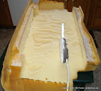 An electric knife is great for removing foam.