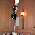 table decorated with foil balloons silver, black and white.jpg