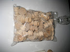 A bag of our wooden candlestick holders. Waiting to be sprayed.
