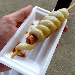 hotdog wrapped in fried dough - interesting snack indeed at Edo Wonderland in Nikko, Japan 