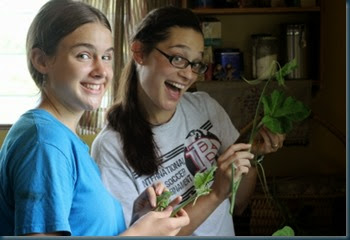 Sarah & Edi goofing off with greens
