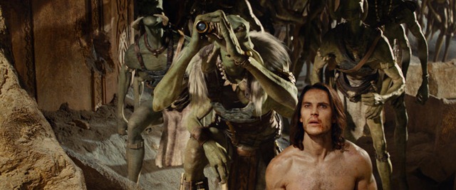 "JOHN CARTER"..L to R: Tars Tarkas (Willem Dafoe), John Carter (Taylor Kitsch)..©2011 Disney. JOHN CARTER™ ERB, Inc.