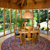 The sunny nook offers a perfect view of the pond and waterfall.