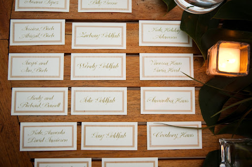 Calligraphed escort cards helped guests find their seats. Calligraphed escort cards helped guests find their seats.
