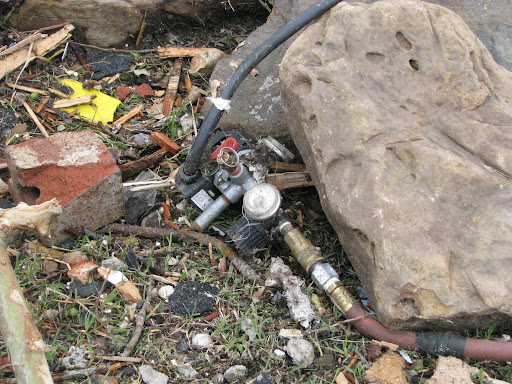 Hospital equipment strewn on the ground near St. John's Regional Health Center in Joplin.
(Photo credit: Jennifer Moore)