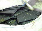 The yellow furs now are turned into shiny black hard rubber - but this first round is only meant to be ground to ebonite powder. The second round of mixing and vulcanizing will produce the high quality hard rubber.