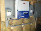 A Fronius inverter that sells the power of a 3.150 kilowatt solar array to the grid on Wolfe Island.