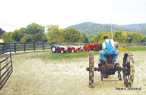 Driving tractor into place 3x.jpg