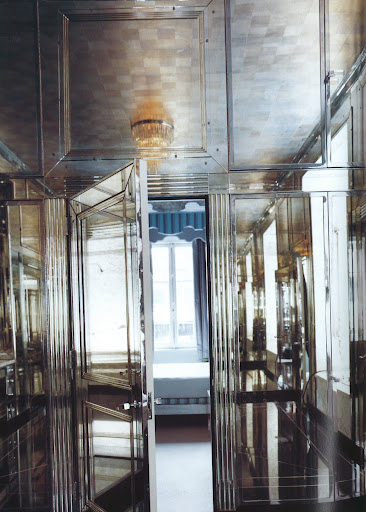 An extraordinary mirrored dressing room articulated with fluted pilasters, designed for meatpacking baron Lester Armour by architect David Adler, is now installed in the New York town house of Miles Redd. (Regency Redux, Rizzoli)