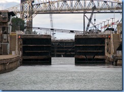 4956 Michigan - Sault Sainte Marie, MI - St Marys River - Soo Locks Boat Tours - MacArthur Lock, lock gates and safety boom opening 4956 Michigan - Sault Sainte Marie, MI - St Marys River - Soo Locks Boat Tours - MacArthur Lock, lock gates and safety boom opening