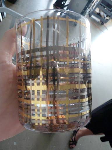 Crate and Barrel's pewter and gold banded tumbler.