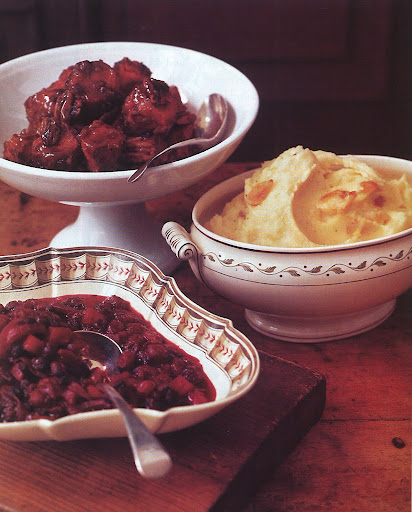 The side dishes include baked sweet potatoes and pecans, roasted-garlic mashed potatoes, and chunky apple-cranberry sauce. The side dishes include baked sweet potatoes and pecans, roasted-garlic mashed potatoes, and chunky apple-cranberry sauce.