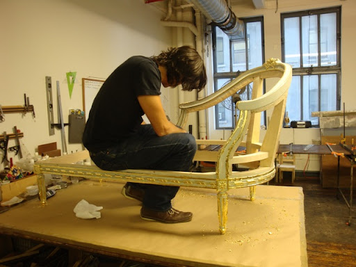 Christophe is hard at work in his studio bringing life and intricacy to this elegant chaise frame. Christophe is hard at work in his studio bringing life and intricacy to this elegant chaise frame.