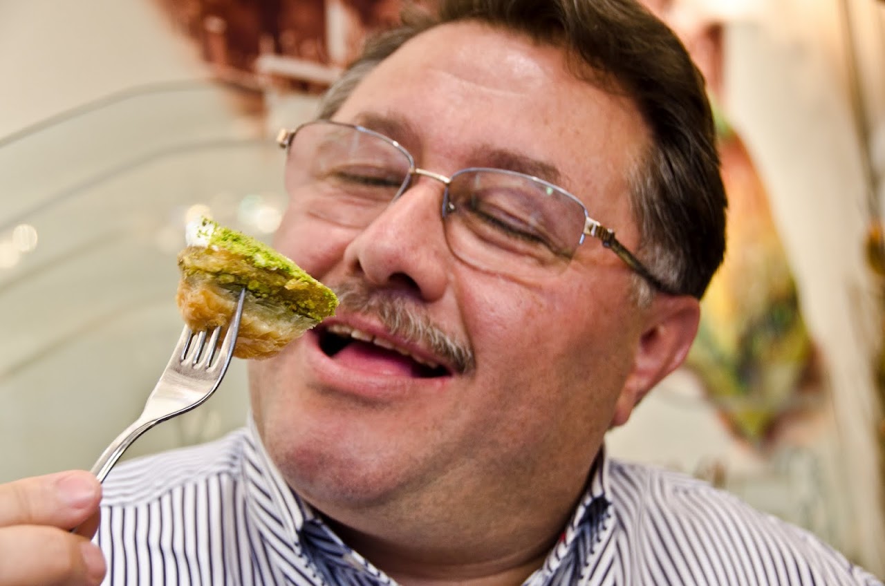 Nadir Gullu eating baklava