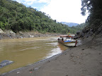 Our boat, moored up on a sand bank for our lunch stop and waterfall walk.