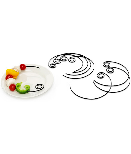 The shape of these skewers is great. No more kebabs hanging off your plate. (uncommongoods.com) The shape of these skewers is great. No more kebabs hanging off your plate. (uncommongoods.com)