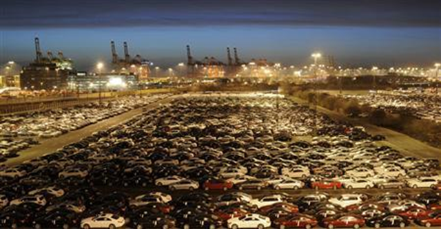 Mercedes cars at a shipping terminal in the harbor of the German northern town of Bremerhaven, 8 March 2012. Germany's economy crept back into growth at the start of 2013 but not by enough to stop the euro zone from contracting for a sixth straight quarter, and France slid into recession. Photo: Fabian Bimmer / REUTERS