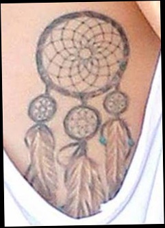 Miley's dreamcatcher tattoo