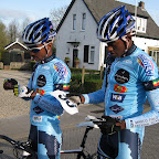 Ethiopian riders on Marco Polo Cycling Donckers Koffie, Binyam Bekele and Alem Abebe pinning their numbers at a race in Europe. (photo: Remko Kramer)