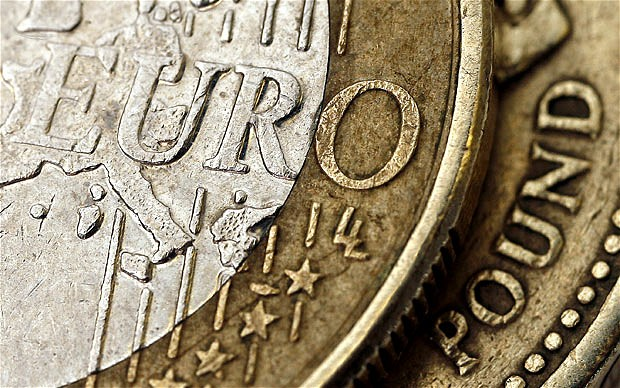 Euro coin. The U.K. Treasury confirmed earlier this month that contingency planning for a collapse is now under way. BLOOMBERG