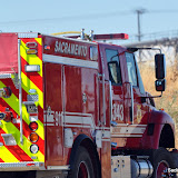 This gras fire was located around the railroad tracks north of C Street off 20th Street near Downtown Sacramento. SFD's intern PIO, Ryan Larkin stated the fire was aprox 1 acre and a portion of the railroad tracks was shut down. BC Williams stated that railroad ties had also caught fire. The cause remains under investigation. News_120605_GrassFire_Downtown
