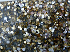 Edie Parker sent us a few clutches that had glitter in lucite. They're smooth but have such depth to them.