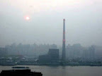 Escena futurista ???, el sol lucha con el smog a las 5 de la tarde