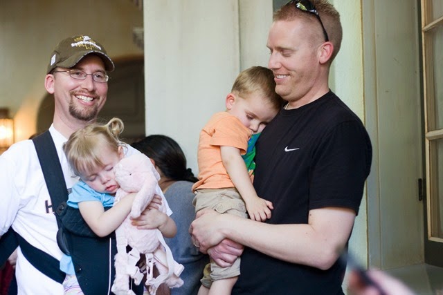 Dan and Jason holding sleeping Emma and Jacob 2