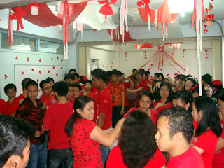 Ma'am Beth Lumangyao checks the matching hearts.