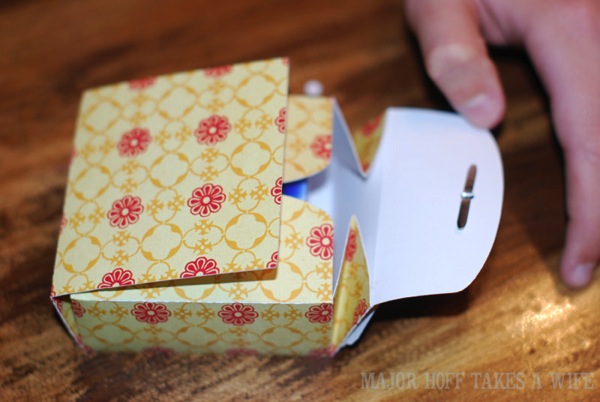 Use a brad to secure tag to SVG box Use a brad to secure tag to SVG box