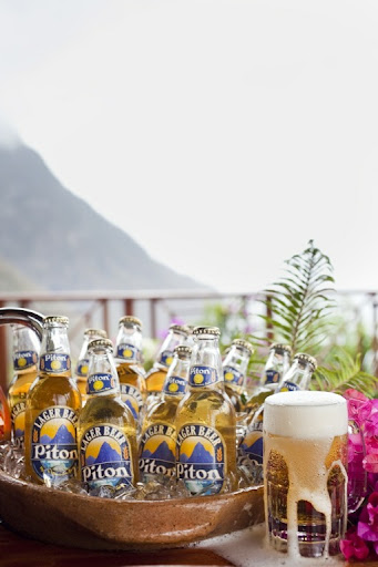 The resort overlooks the Piton Mountains. You can see them in the distance and also on the local beer label.