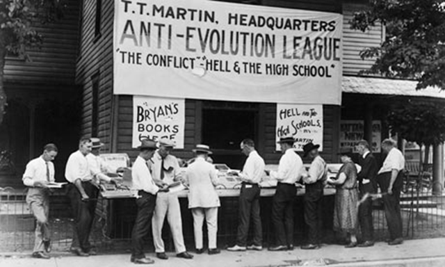 An anti-evolution league holds a book sale at the opening of the Scopes 'monkey' trial in 1925, when a Tennessee public school teacher was convicted and fined for teaching evolution. Corbis