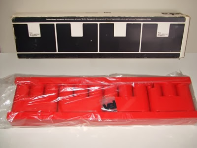 Red Velca MiniVip coat rack with packaging