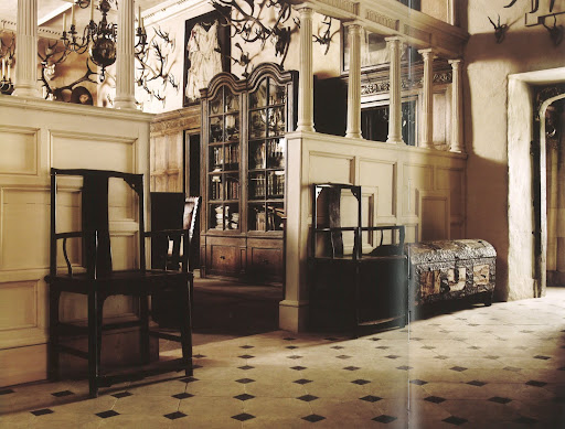 The large hall of a restored medieval manor in Bristol becomes a place to house everything that the owners love and cherish.