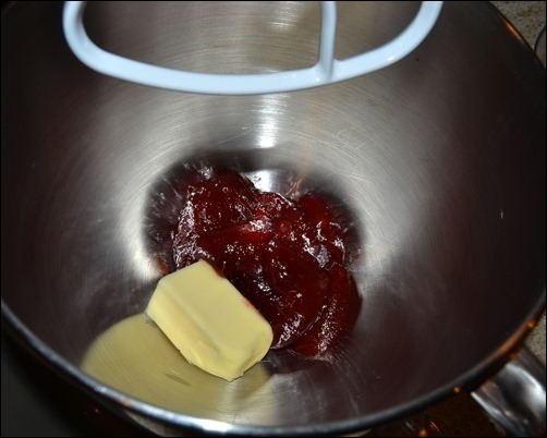 combine butter and strawberry jam