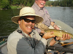 Jack Saunders caught a cuttbow on the Blackfoot river. Jack Mauer is holding the fish.